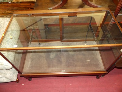 Lot 1397 - An Edwardian mahogany and glazed shop display...