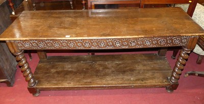 Lot 1403 - An oak long two-tier hall table, with flower...