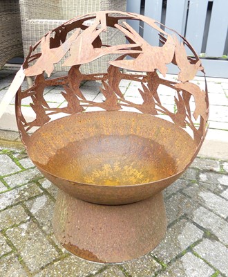 Lot 1409 - A contemporary rusted steel garden sphere...