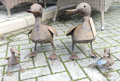 Lot 1411 - A pair of pressed metal garden model ducks,...