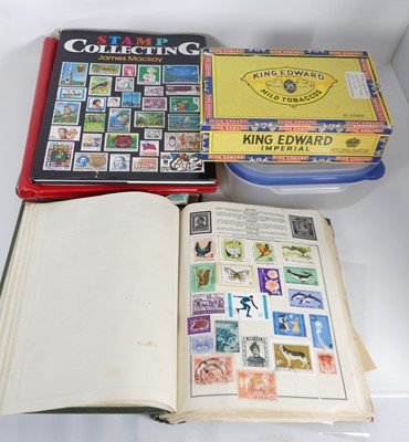 Lot 515 - A collection of world stamps, mainly housed in...