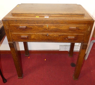 Lot 541 - A 1930s oak canteen chest, containing a part...