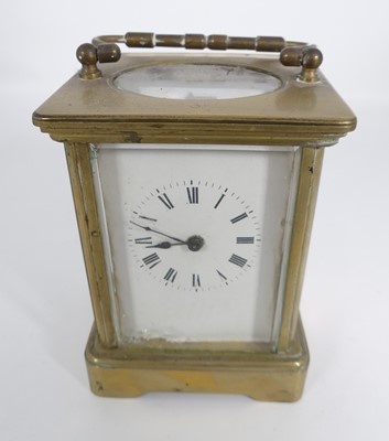 Lot 543 - A lacquered brass carriage clock, the...