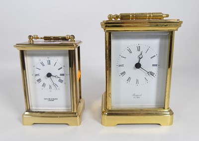 Lot 545 - Two lacquered brass carriage clocks, the...