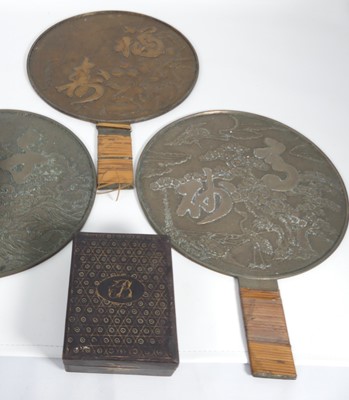 Lot 553 - Three various Japanese metal mirrors; together...