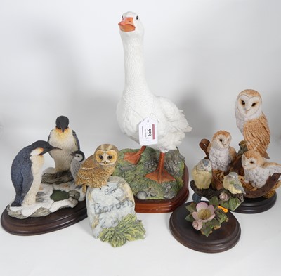 Lot 559 - A collection of five resin models of birds, to...