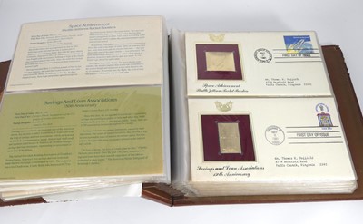 Lot 565 - An album of Golden Replicas of United States...