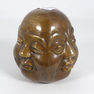 Lot 570 - A Chinese brass four-face Buddha, h.11cm