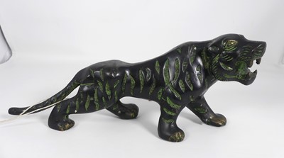 Lot 575 - A green painted metal model of a tiger, h.11cm