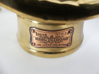 Lot 604 - Three various vintage brass carriage lamps,...