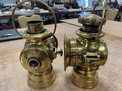 Lot 604 - Three various vintage brass carriage lamps,...