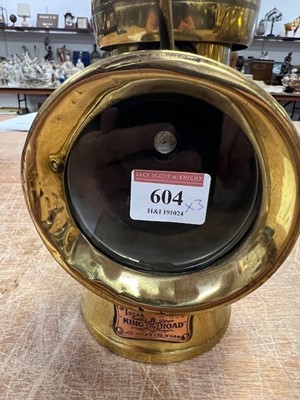 Lot 604 - Three various vintage brass carriage lamps,...