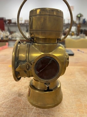 Lot 604 - Three various vintage brass carriage lamps,...
