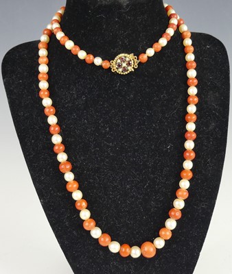 Lot 431 - A beaded coral and cultured pearl long...