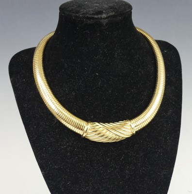 Lot 2759 - A Christian Dior gilt metal choker, arranged...