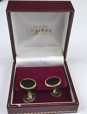 Lot 2761 - A pair of modern gent's 9ct gold and black...