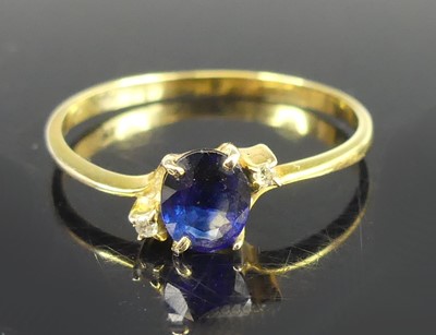 Lot 2752 - A contemporary 14ct gold, sapphire and diamond...