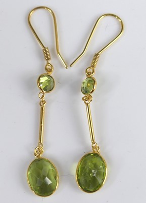 Lot 2765 - A pair of 14ct gold and green peridot set...