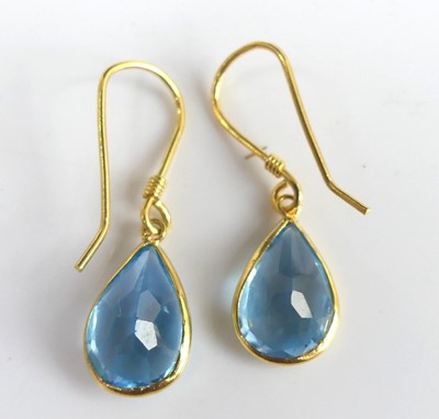 Lot 2766 - A pair of 14ct gold blue topaz set earrings,...