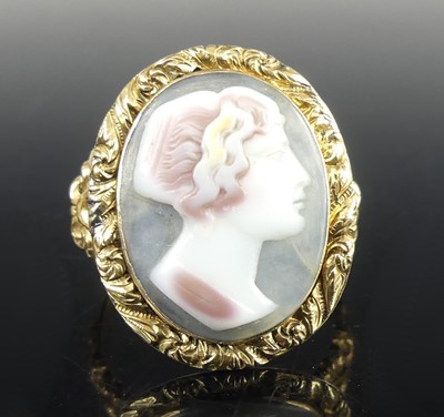 Lot 394 - A yellow metal oval agate cameo ring,...