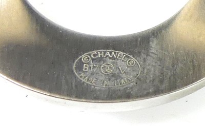 Lot 2709 - A Chanel-CC logo open cut-out B17V cuff bangle,...
