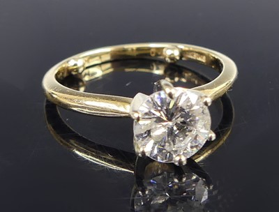 Lot 2658 - A contemporary 14ct gold diamond solitaire...