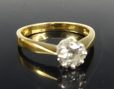 Lot 2715 - An 18ct gold diamond solitaire ring, the claw...