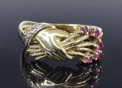 Lot 2774 - A 14ct gold, ruby and diamond set dress ring,...