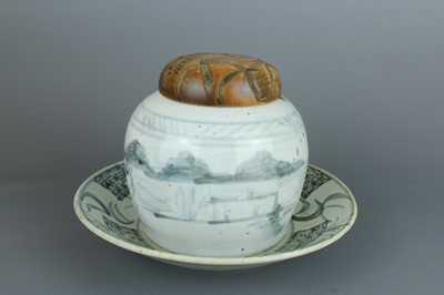 Lot 23 - A Chinese blue and white jar with a matching...