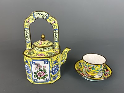 Lot 27 - A set of Chinese yellow ground painted enamel...