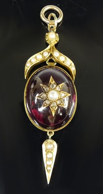 Lot 2753 - A Victorian yellow metal garnet and seed pearl...