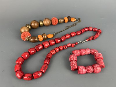 Lot 40 - Two oriental necklaces and a bracelet, 20th...