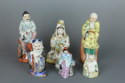 Lot 51 - A group of six Chinese porcelain figures,...