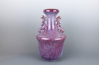 Lot 58 - A Chinese flambé-glazed vase with two handles,...