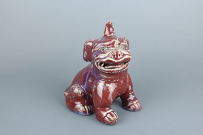 Lot 59 - A Chinese flambé-glazed horned beast luduan,...