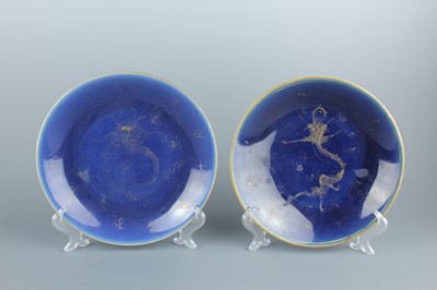 Lot 65 - A pair of Chinese blue ground gilded “dragon”...