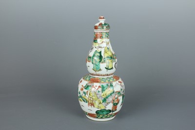 Lot 66 - A Chinese famille verte double-gourd “figural”...