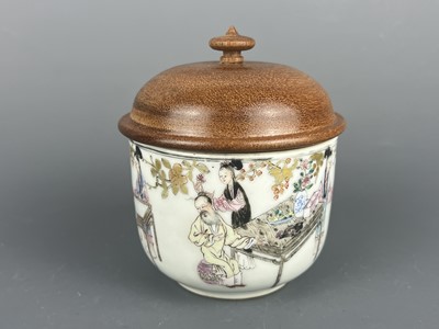 Lot 70 - A small Chinese famille rose bowl with wooden...