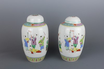 Lot 89 - A pair of Chinese polychrome enameled “boys”...