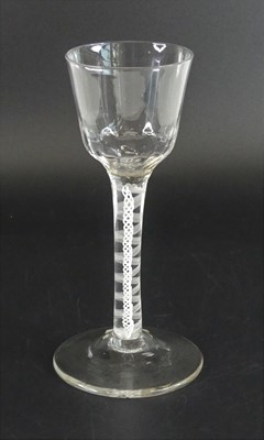 Lot 2135 - A wine glass, circa 1765, the basal ribbed...