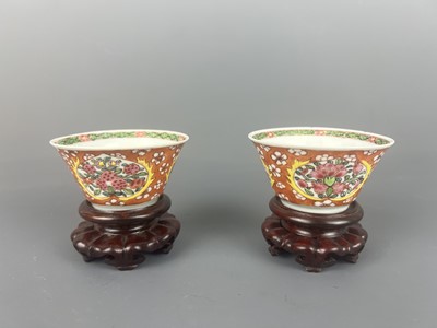 Lot 93 - A pair of Chinese famille rose “flowers” cups,...