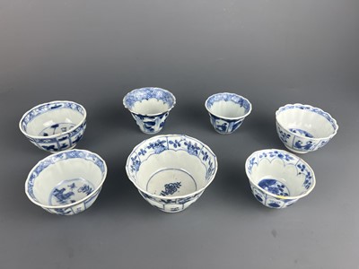 Lot 103 - Seven Chinese blue and white cups, Qing...