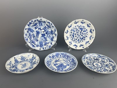 Lot 104 - Five Chinese blue and white saucer dishes,...