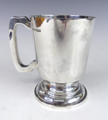 Lot 162 - A late Art Deco silver pedestal cup, of...