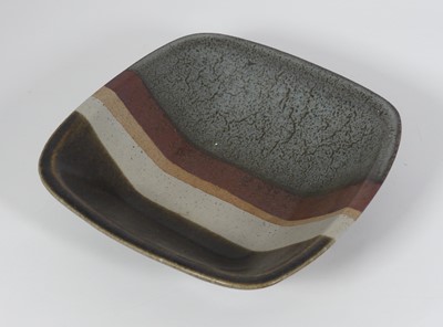 Lot 56 - Peter Lane (b.1932) - a studio stoneware dish,...