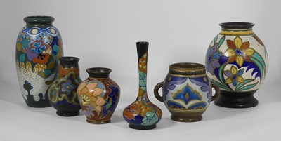 Lot 54 - A collection of six Dutch Gouda pottery vases,...