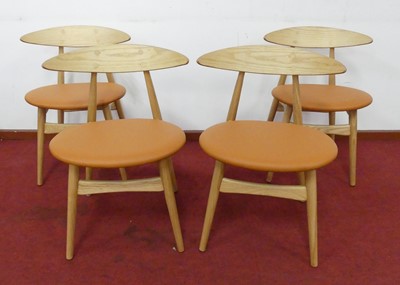 Lot 488 - In the style of Hans Wegner - a set of four...