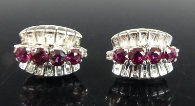 Lot 447 - A pair of white metal ruby and diamond...