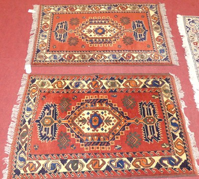 Lot 1162 - A pair of Turkish woollen rust ground Kazak...