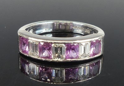 Lot 2243 - An 18ct white gold, pink sapphire and diamond...